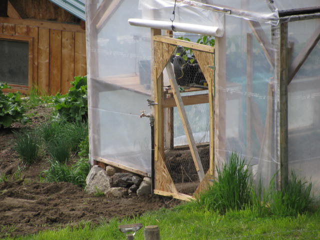 A new door made of chicken wire and wood