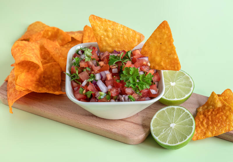Home made Salsa recipe for canning. bowl of fresh salsa with chips