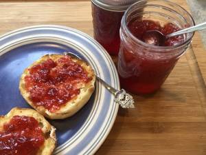 no cook strawberry jam in a jar along with english muffins with jam on them