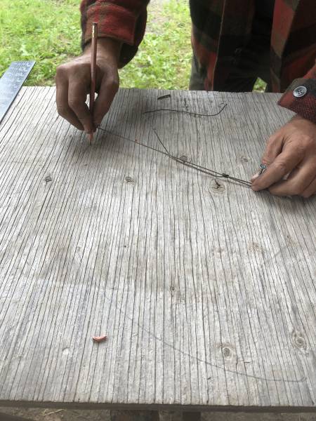 you can use a string and pencil to make a perfect circle for the base of the star
