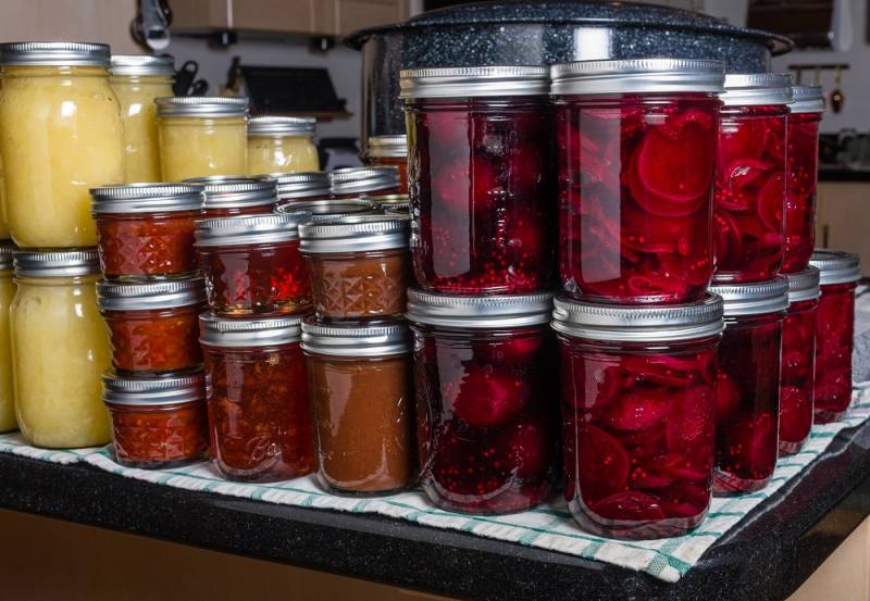 jars of home canned food in pantry