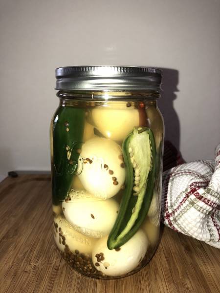 pickled eggs in a jar to preserve