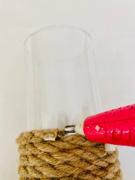Glue rope to vase with glue gun