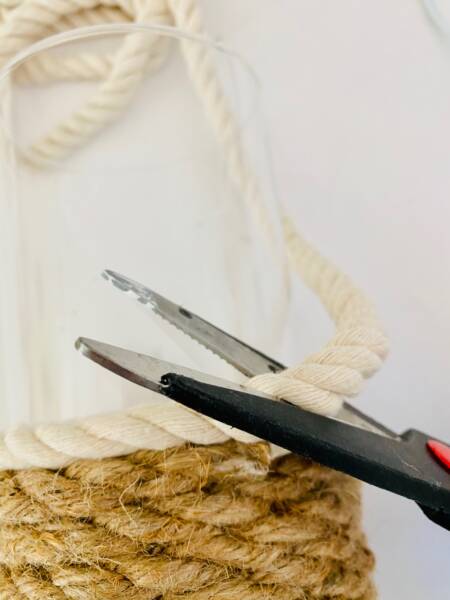 Wrap once around with cotton rope, then cut using scissors.