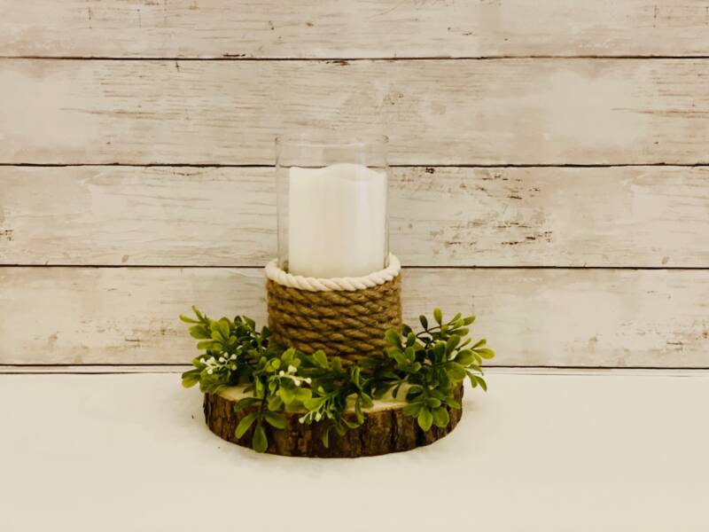 Finished rope wrapped candle holder on table.