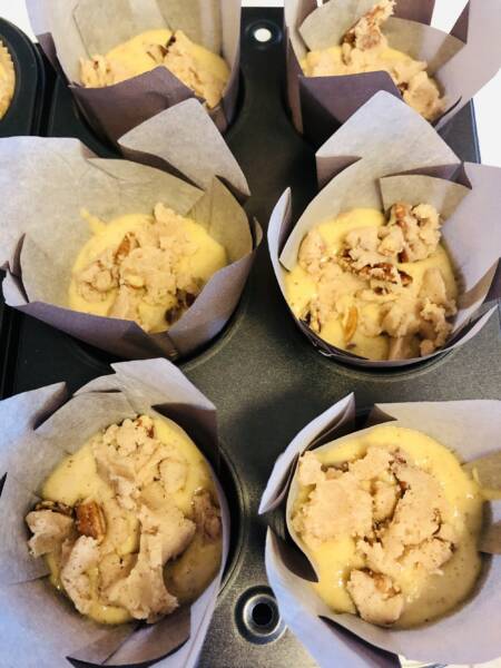 Muffins with streusel topping ready for baking