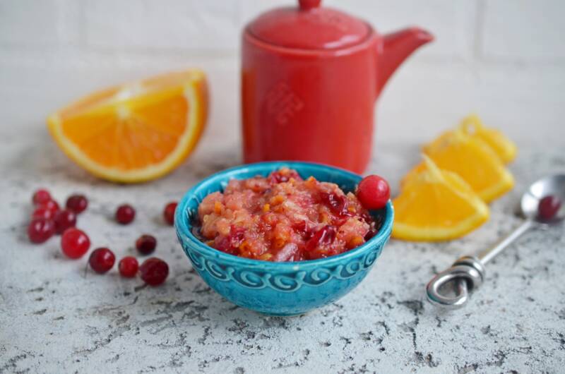 Cranberry orange relish on a counter with ingredients.