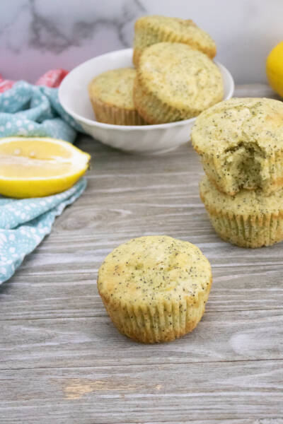 Lemon poppy seed muffins on a counter.