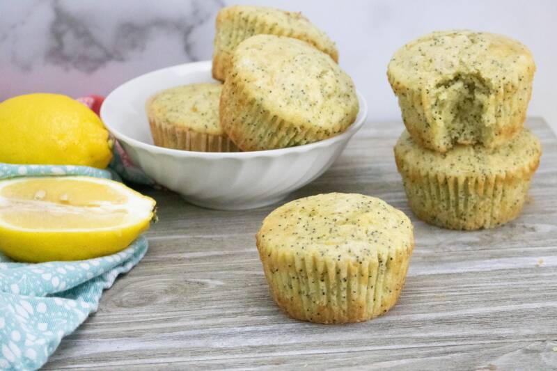 Lemon poppy seed muffins on a counter.