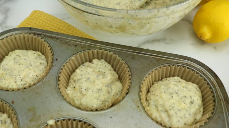 Muffin batter in muffin liners.